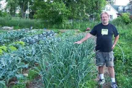 Scott Kelland standing in the market garden at New Terra Farm